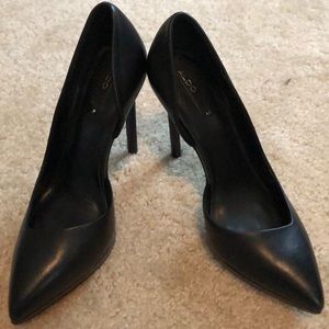EUC Aldo black spike pumps.
